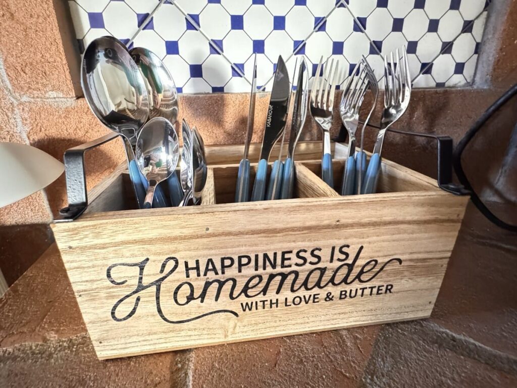 Handcrafted cutlery caddy detail in the La carta apartment, Borgo Braila, Umbria