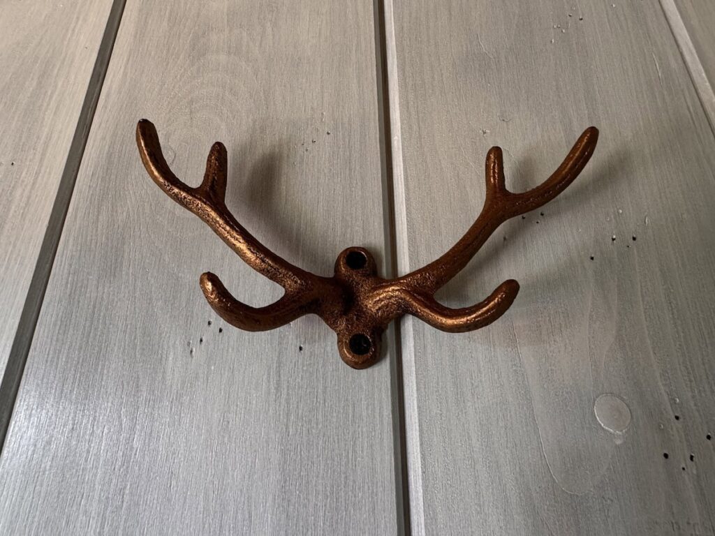 Antler decoration on a door in the La carta apartment, Borgo Braila, Umbria