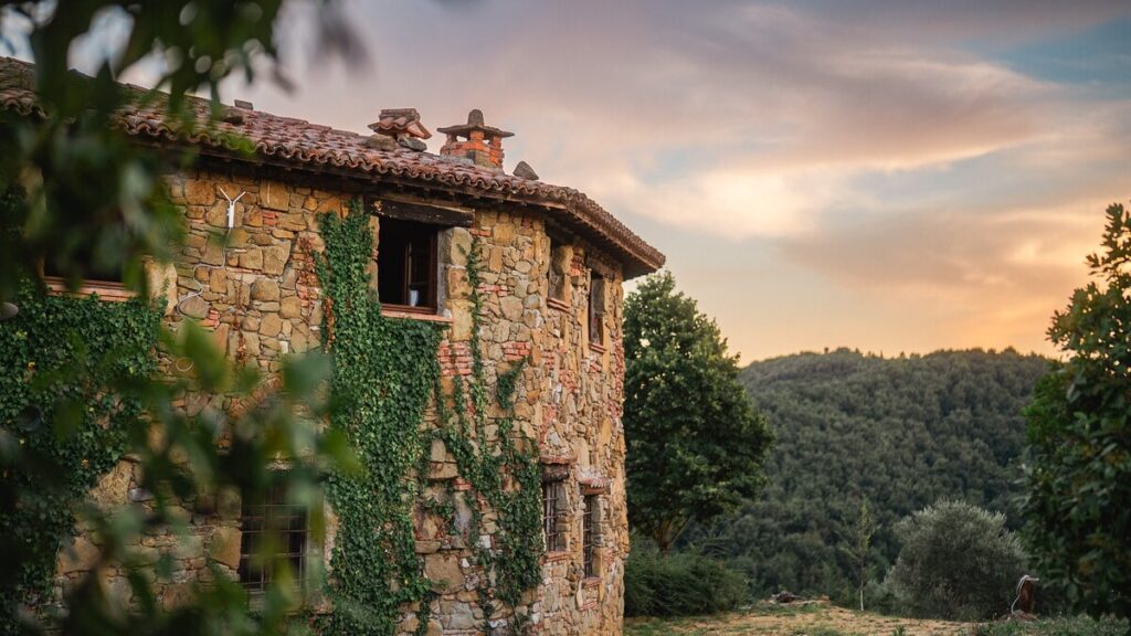 The village at sunset over the hills in the Il ponente apartment, Borgo Braila, Umbria