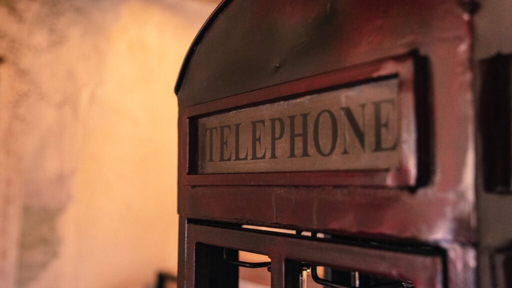 Vintage telephone sign detail in the Il cardinale apartment, Borgo Braila, Umbria