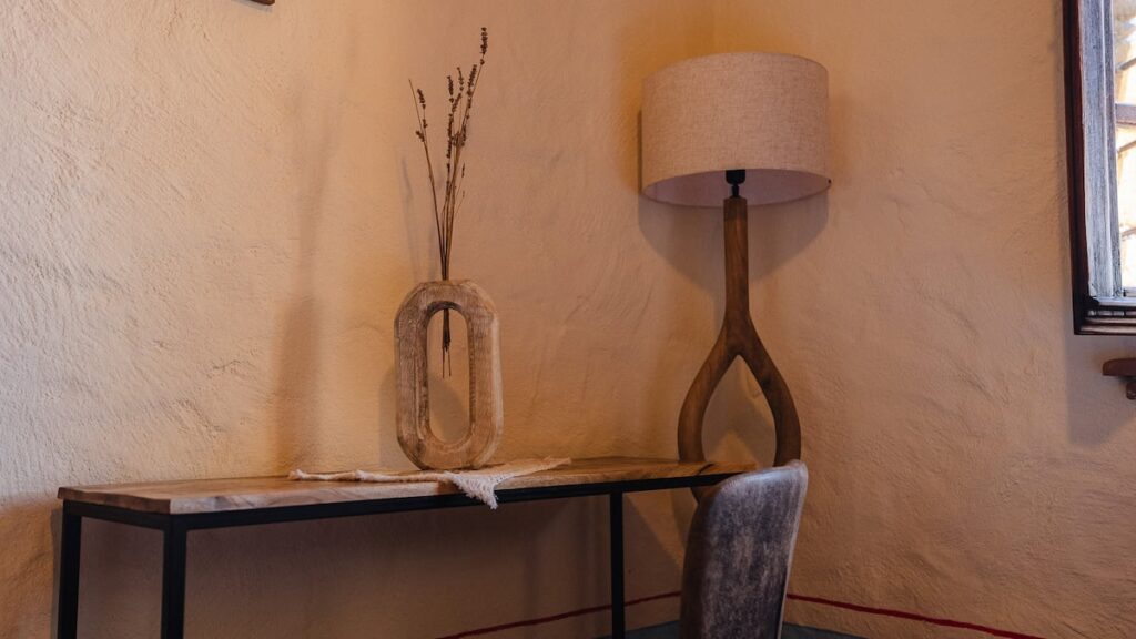 Console table with a lamp detail in the Il cardinale apartment, Borgo Braila, Umbria