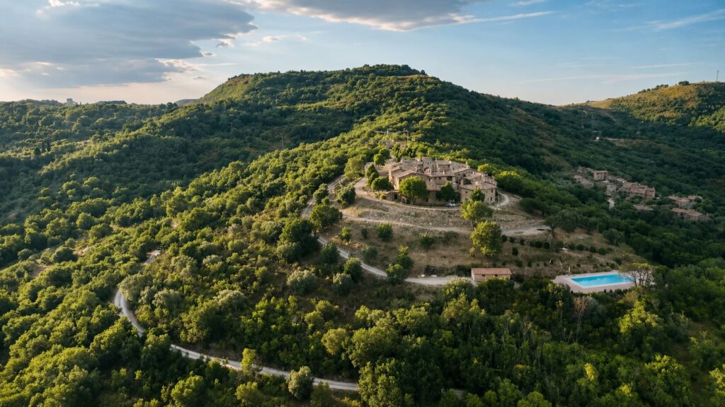 Aerial view of Borgo Braila and the surrounding Umbrian countryside and olive groves