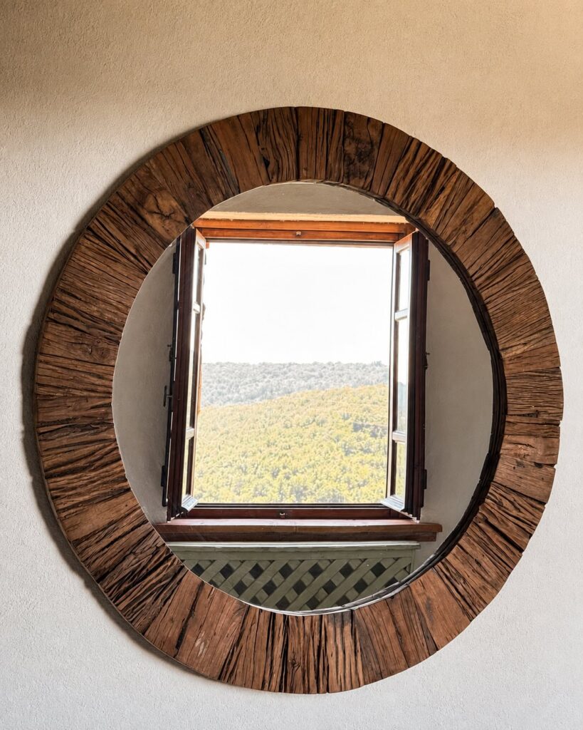 Cozy bedroom with natural materials in the Il cavaliere apartment at Borgo Braila