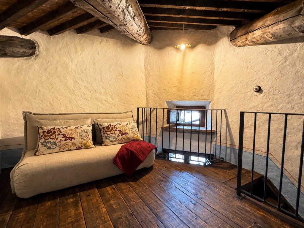 Bright bedroom with countryside views at Borgo Braila, Umbria
