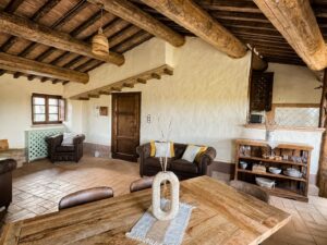 Cozy living space with natural light in the Il belvedere apartment at Borgo Braila